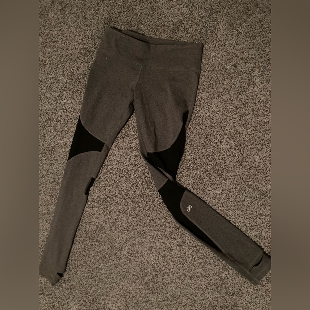 Alo yoga leggings with cutout feet and sheer detail. Size L. Grey and black